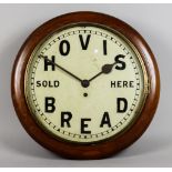 An Early 20th Century Mahogany Cased Dial Wall Clock, the 12ins diameter white enamel dial