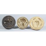Three Carved Wood Butter Stamps, Victorian, carved with a swan, 4ins diameter, wheat sheaf, 3.5ins