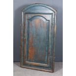 A Late 18th Century Blue Painted Pine Hanging Corner Cupboard with arched and moulded top, fitted