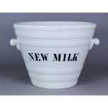 A White Glazed Pottery "New Milk" Two-Handled Pail, Early 20th Century, the body moulded with six