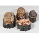 A Copper Jelly Mould and Three Copper and Tinned Metal Jelly Moulds, Victorian, the copper oval