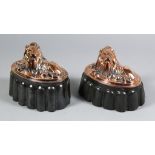 Two Copper and Tinned Metal Oval Jelly Moulds, Victorian, each moulded with a recumbent lion, one