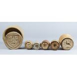 Six Carved Wood Butter Stamps of Plunger Type, Victorian, carved with an agricultural crest and