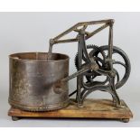 A Cast Iron Hasher Machine, Late 19th Century, with traces of original black and gilt paint, on