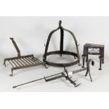 A Wrought Iron Trivet, 18th Century, 10.25ins wide x 12.25ins deep x 2.25ins high (excluding