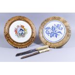 Two Turned and Carved Wood Bread Boards with Ceramic Inserts, Late Victorian, one worded "The