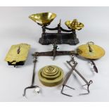 A Set of Black Painted Cast Iron and Brass Counter Scales to weigh 1lb, three other scales,