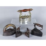 A Chrome Plated and Brass Mounted Oval Box Iron, 19th Century, and Four Other Irons, the box iron