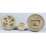 Three Carved Wood Butter Stamps, Victorian, carved with a thistle and leaves, 4.125ins diameter, a