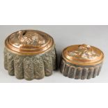 Two Victorian Copper and Tinned Metal Oval Jelly Moulds, one moulded with a standing peacock, 7.