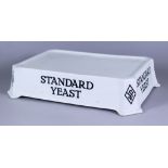 A White Glazed Pottery "Standard Yeast" Rectangular Slab, printed in black, 13ins x 9ins x 3.25ins