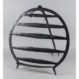 An Irish Wrought Iron Harnen Stand, 18th/19th Century, of horseshoe shape with five horizontal bars,