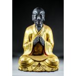A Large Chinese Carved and Painted Giltwood Seated Figure of a Buddha,