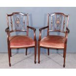 A Pair of Edwardian Mahogany Armchairs of "Hepplewhite" Design, the backs each with three fretted