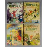 Thirty-Five Rupert Bear Annuals, 1943 to 2016, including "More Rupert Adventures" (1943), "Rupert in