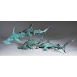 20th Century School - Verdigris bronze group of four hammerhead sharks, unsigned, 18ins x 8ins high