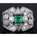 An Emerald and Diamond Cluster Ring, Early 20th Century, in white coloured metal mount, set with a