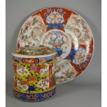 A Japanese Porcelain Imari Circular Charger, painted in a typical palette with a central design of a