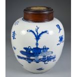 A Chinese Blue and White Porcelain Jar, Kangxi Period, painted with vases of flowers, censers,