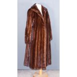 A Lady's Mink Full Length Fur Coat, with retailers label for Ricemans of Canterbury