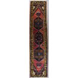 An Anatolian Runner, Early 20th Century, woven in colours, the field filled with three hexagonal