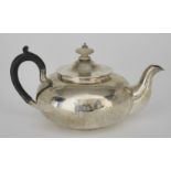 A Mid 19th Century Russian Plain Silver Teapot, by Andrei Kovalsky, Moscow 1855, with squat circular