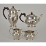An Elizabeth II Harlequin Silver Four Piece Tea Service, by Barker Bros Silver Ltd, Birmingham