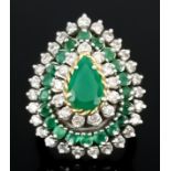 An Emerald and Diamond Cluster Ring, Modern, in 18ct gold mount, the centre set with emerald,