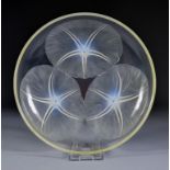 A Lalique Pale Blue Opalescent and Clear Glass Circular Shallow Dish of Volubilis Pattern No. 383,
