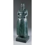 20th Century Continental School - Verdigris bronze standing figure of an elderly woman in a full