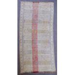 A North African Sumac Weaving, woven in faded colours with rows of geometric motifs, 11ft x 5ft