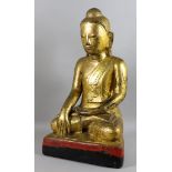 Eastern School (20th Century) - Carved Gilt Wood and Ebonised Figure