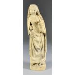 A Limestone Carving in the Medieval Manner - Standing figure of a maiden holding an urn in her
