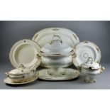 A Staffordshire Gilt Decorated Pottery Dinner Service, Late 19th Century, with gilt leaf scroll