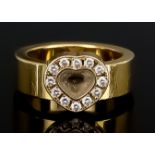 A "Happy Diamonds" Diamond Ring, Modern, by Chopard, in 18ct gold mount, Serial No. 2770480, set