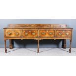 An 18th Century Oak Dresser Base, with moulded edge to top, shaped apron and four drawers with