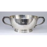 A George V Planished Silver Circular Two-Handled Bowl, by Asprey & Co. Ltd, Birmingham 1927, with