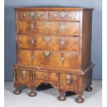 A Mid 18th Century Walnut and Oak Sided Chest on Stand, the drawer fronts with matched figured