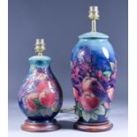 Two Moorcroft Pottery Electric Table Lamps, Late 20th Century, tubelined with birds picking fruit