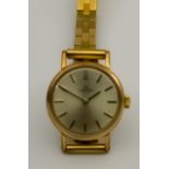A Lady's Omega Manual Wind Wristwatch, 20th Century, 9ct Gold Cased, 20mm diameter, the silver