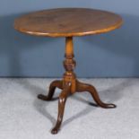 A George III Mahogany Circular Tripod Table, with plain top, on turned central column with wrythen