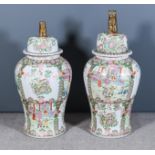 A Pair of Chinese Porcelain Baluster Shaped Vases and Domed Covers, Modern, with gilt kylin finials,