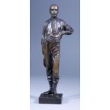 J. H. - Standing Bronze Figure of Robert Louis Stevenson, 20th Century, the figure holding a hat