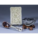 I* A Chinese Cantonese Carved Ivory Card Case, 19th Century, of shaped outline, carved with
