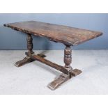 An Old Oak Refectory Table of "17th Century" Design, with heavy three-plank top (patched in