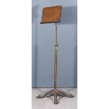 A Victorian Mahogany Brass and Cast Iron Music Stand, by Alfred Carter, the rectangular top 12ins