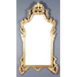 A Pair of Modern Italian Carved Gilt Wood Rectangular Wall Mirrors, of shaped and moulded outline,