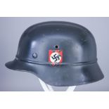 A German World War II Helmet, painted with double decals