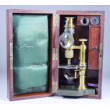 A Lacquered Brass and Cast Iron Monocular Microscope, Late 19th Century, 9.75ins high, the