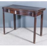 A George III Mahogany Concertina Action Serpentine Fronted Card Table, with green baize lined